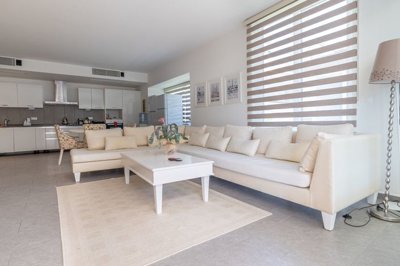 A Seafront Duplex Apartment For Sale in Fethiye - Fully furnished modern lounge