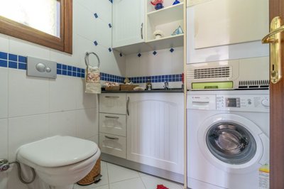 Detached 2-Bedroom Property For Sale In Fethiye - Bathroom with washing machine