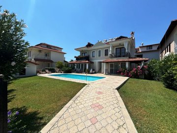 Must-View Ground Floor Apartment For Sale In Dalyan - A gorgeous communal exterior with pool