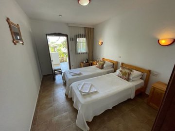 Pretty Fully Established Hotel In Dalyan For Sale - Twin bedroom with exterior access