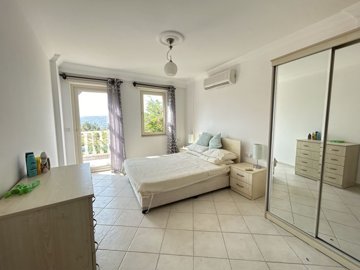 A Pretty Bodrum Apartment For Sale In Mugla, Milas - Very spacious double bedroom with balcony and ensuite