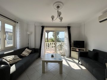 A Pretty Bodrum Apartment For Sale In Mugla, Milas - Lounge area with balcony