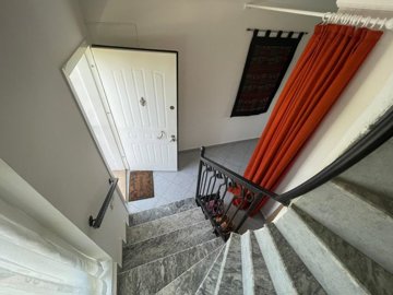 An Attractive Duplex Apartment In Fethiye For Sale - Staircase down to hallway