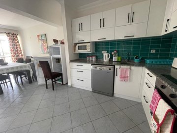 An Attractive Duplex Apartment In Fethiye For Sale - Large modern kitchen with dining area