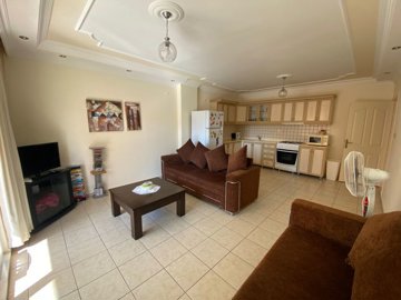 A Fantastic Value 3-Bed Apartment For sale In Didim - Lounge through to the kitchen