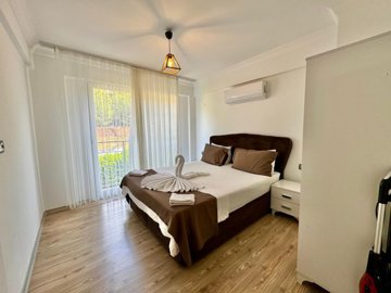 A Stylish Key-Ready Fethiye Property For Sale – Spacious double bedroom with French balcony