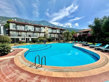 Ready-To-Move Apartment For Sale In Ovacik, Fethiye – A pretty established complex with shared pool