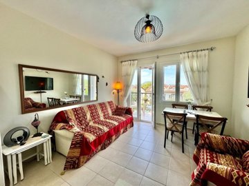 Ready-To-Move Apartment For Sale In Ovacik, Fethiye – Living room with access to a balcony