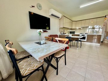 Ready-To-Move Apartment For Sale In Ovacik, Fethiye – Dining area through to the kitchen