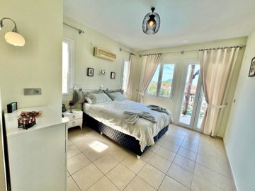 Ready-To-Move Apartment For Sale In Ovacik, Fethiye – First bedroom, double room with a balcony