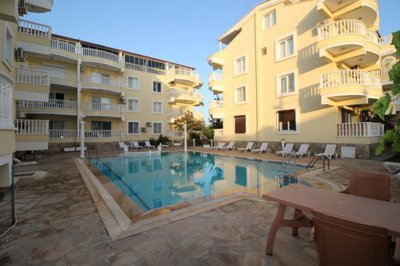 Delightful Furnished Apartment For Sale In Altinkum – An established complex with pool