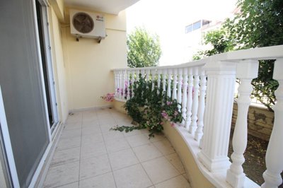 Delightful Furnished Apartment For Sale In Altinkum – Balcony with pretty climbing foliage