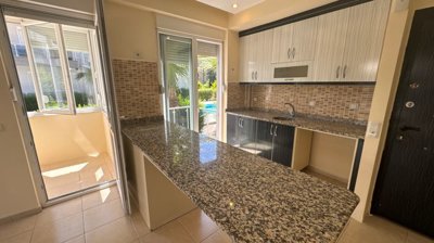 A Bright & Airy Apartment In Antalya For Sale - Kitchen with breakfast bar