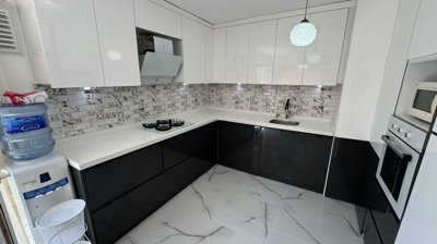 An Immaculate Apartment In Belek, Antalya For Sale - A modern fully fitted kitchen