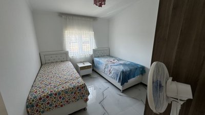 An Immaculate Apartment In Belek, Antalya For Sale - A twin bedroom