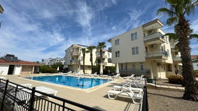 A Great Located Apartment In Belek, Antalya For Sale - Main view of the complex and communal pool