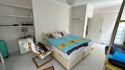 A Great Located Apartment In Belek, Antalya For Sale - Bedroom fully furnished with lots of storage