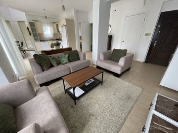 A Charming Two-Bed Apartment In Belek For Sale - Lounge through to the kitchen