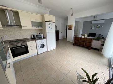 A Charming Two-Bed Apartment In Belek For Sale - Kitchen through to the lounge