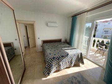 A Glamorous Villa With A Private Pool For Sale in Belek, Antalya - A sundrenched double bedroom with balcony