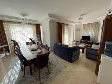 A Glamorous Villa With A Private Pool For Sale in Belek, Antalya - Dining space through to the lounge