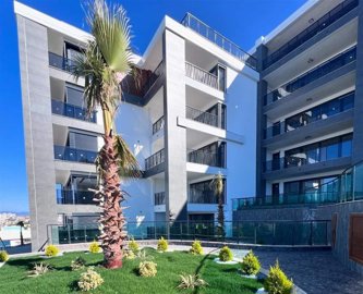 Sea View Kusadasi Apartments with A Pool & Smart-Home System Are For Sale - Modern block with landscape gardens