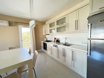 A Delightful Apartment In Bodrum For Sale - Dining area and fully fitted kitchen