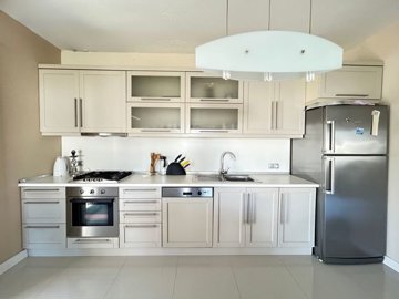 A Delightful Apartment In Bodrum For Sale - Fully fitted kitchen with built-in white goods