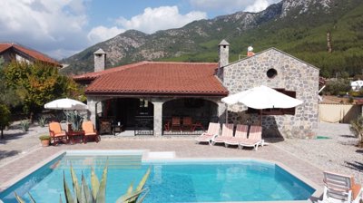 Ready-To-Move Uzumlu Stone Bungalow For Sale - Beautiful property with a private pool