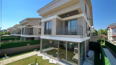 A Spacious Semi-Detached Triplex Villa For Sale In Fethiye - Main view of the triplex villa and private garden