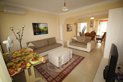 A Fully Furnished Didim Property In Sought After Complex – Lounge through to the dining area