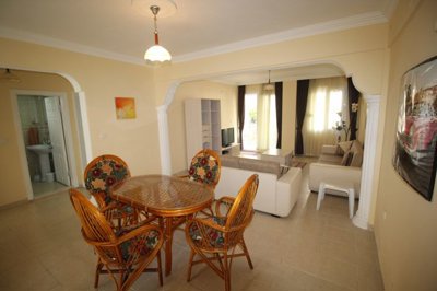 A Fully Furnished Didim Property In Sought After Complex – Dining area through to the lounge