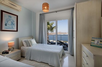 Superb Hillside Apartment For Sale In Bodrum - Light and airy twin bedroom