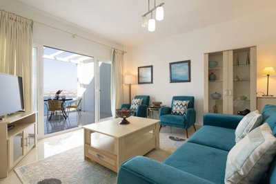 Superb Hillside Apartment For Sale In Bodrum - Living space lounge area with balcony access