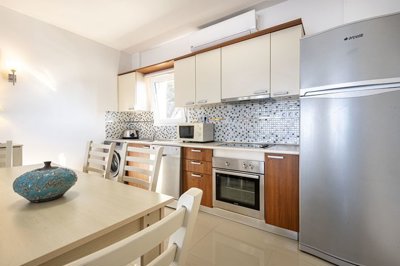 Superb Hillside Apartment For Sale In Bodrum - Fully fitted stylish kitchen with built-in white goods