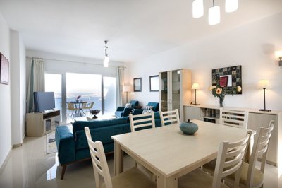 Superb Hillside Apartment For Sale In Bodrum - Kitchen through to the lounge and balcony