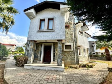 A Traditional Detached Stone Villa For Sale In Fethiye - Main entrance to the villa from driveway