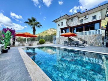 Scenic Detached Villa For Sale In Fethiye - Main view of the villa, pool and exterior space