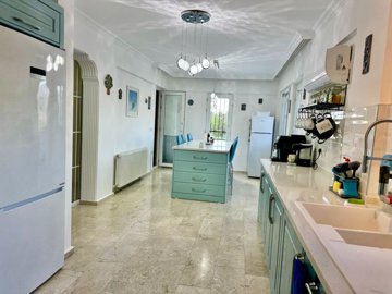 Scenic Detached Villa For Sale In Fethiye – Large fully fitted kitchen with island and white goods