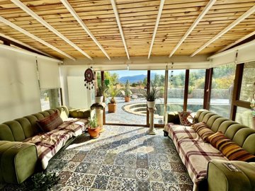 A Exquisite Bespoke Uzumlu Bungalow For Sale - Beautiful conservatory