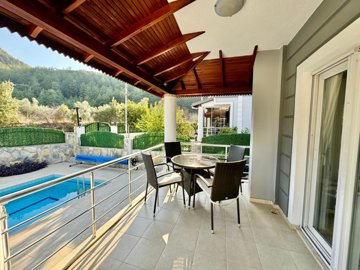 A Tranquil Private Detached Villa In Fethiye For Sale - Covered terrace leading to the pool