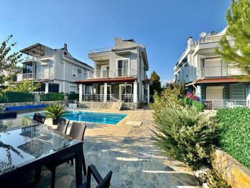 A Tranquil Private Detached Villa In Fethiye For Sale - A vast outdoor living space with mature trees