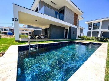 Newly Built Luxury Detached & Semi-Detached Kusadasi Villas For Sale - Main view of the villa and pool