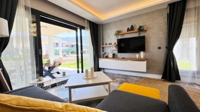 Newly Built Luxury Detached & Semi-Detached Kusadasi Villas For Sale - Lounge with access to the garden and pool