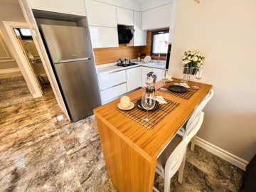 Newly Built Luxury Detached & Semi-Detached Kusadasi Villas For Sale - Kitchen with a breakfast bar