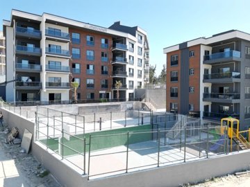 Kusadasi Luxurious Apartments with On-Site Facilities Are For Sale - Sports courts and children's play area