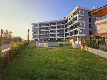 Newly Built Smart-Home Kusadasi Apartment For Sale - Social gardens and play areas for kids