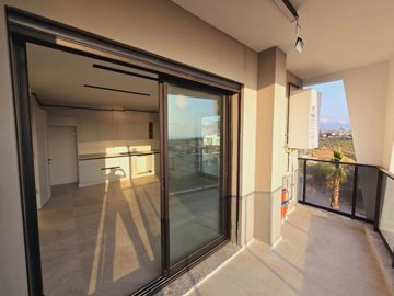 Newly Built Smart-Home Kusadasi Apartment For Sale - A spacious balcony with beautiful sea views