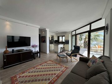 A Serene 2-Bedroom Apartment In Bodrum For Sale - Lounge across to the kitchen