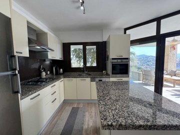 A Serene 2-Bedroom Apartment In Bodrum For Sale - Fully fitted kitchen with built-in white goods